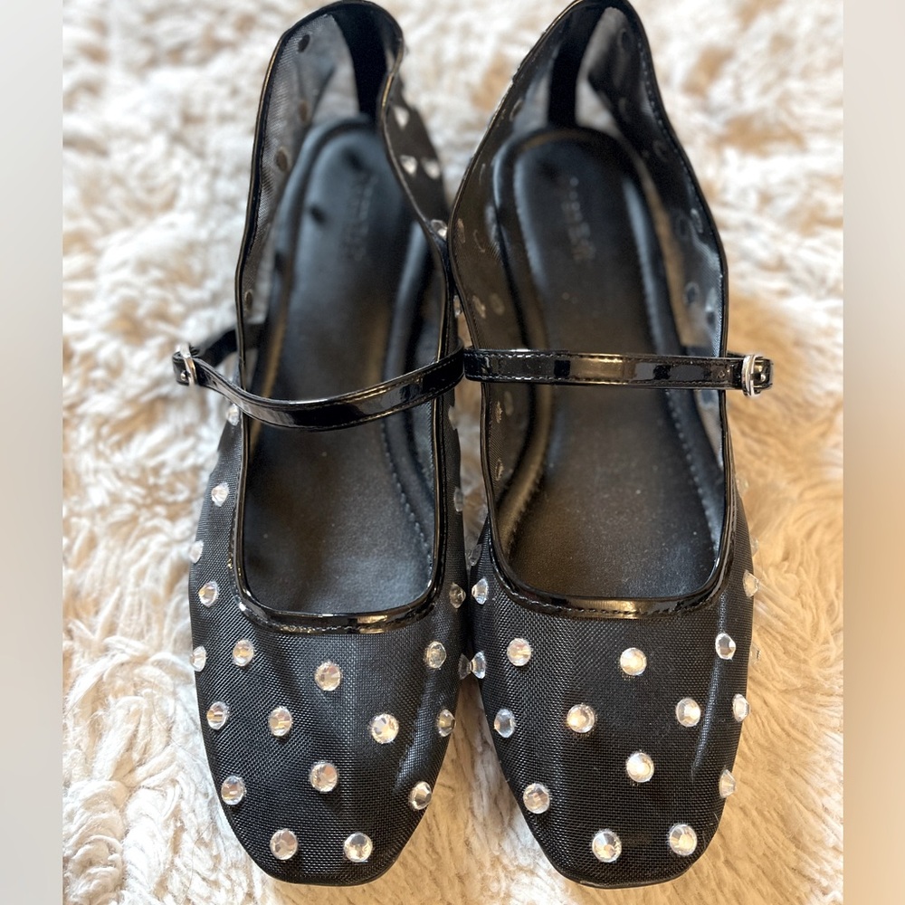 Black mesh and rhinestone Mary Jane’s.